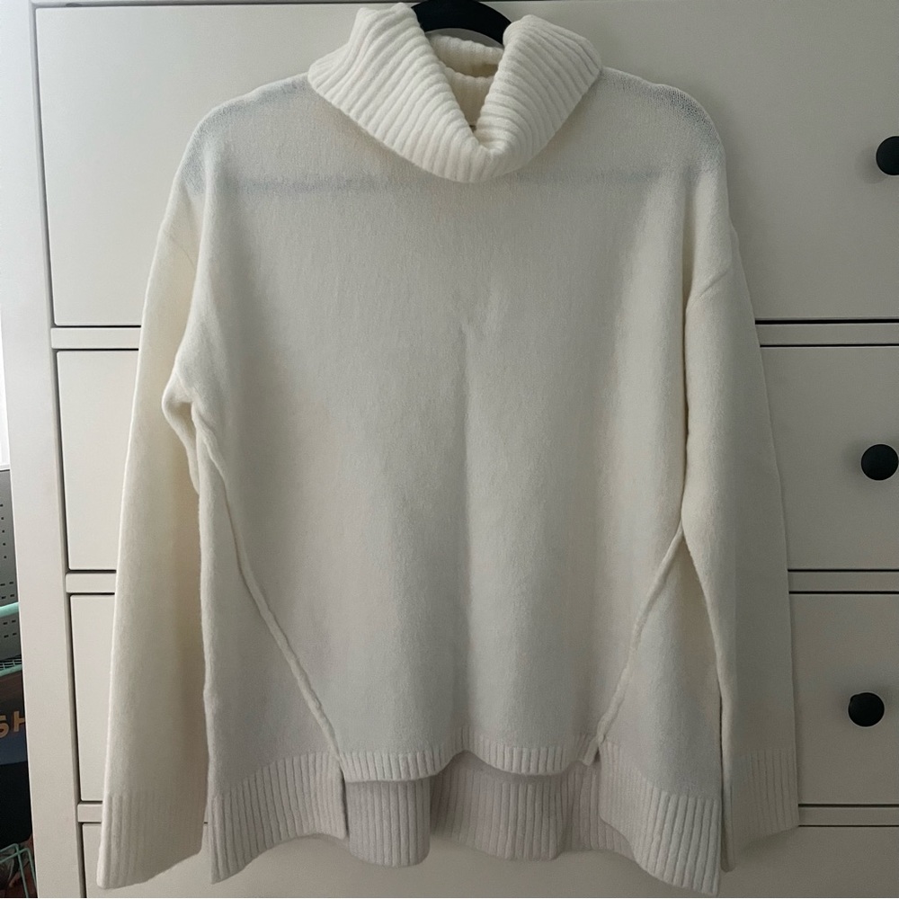 White turtleneck tunic sweater